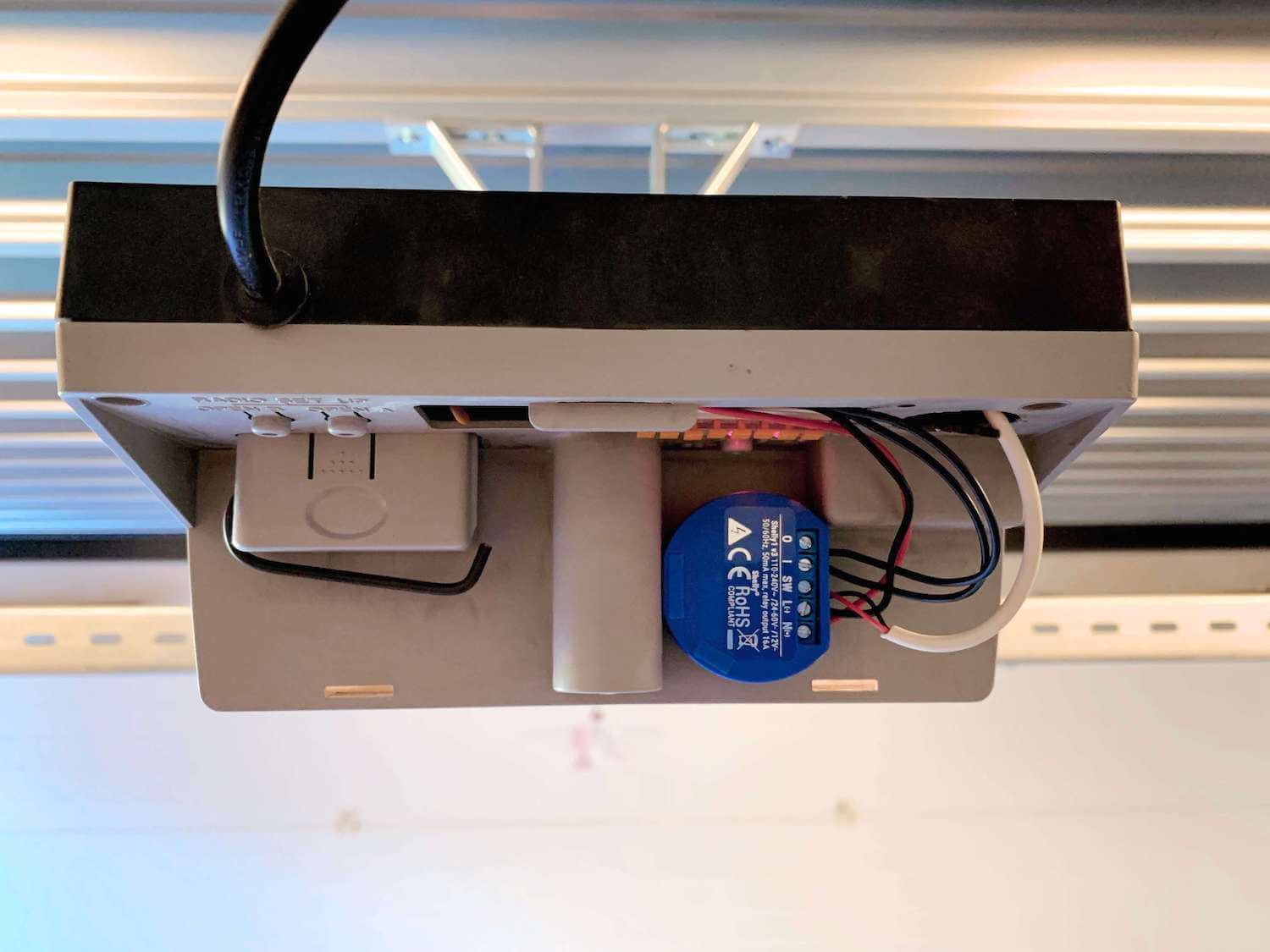 Shelly 1 inside my garage door opener